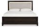 Ashley Express - Neymorton Queen Upholstered Panel Bed with 2 Nightstands