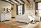 Willowton Queen Sleigh Bed with Mirrored Dresser and Nightstand