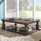 Ashley Express - Johnelle Rectangular Cocktail Table